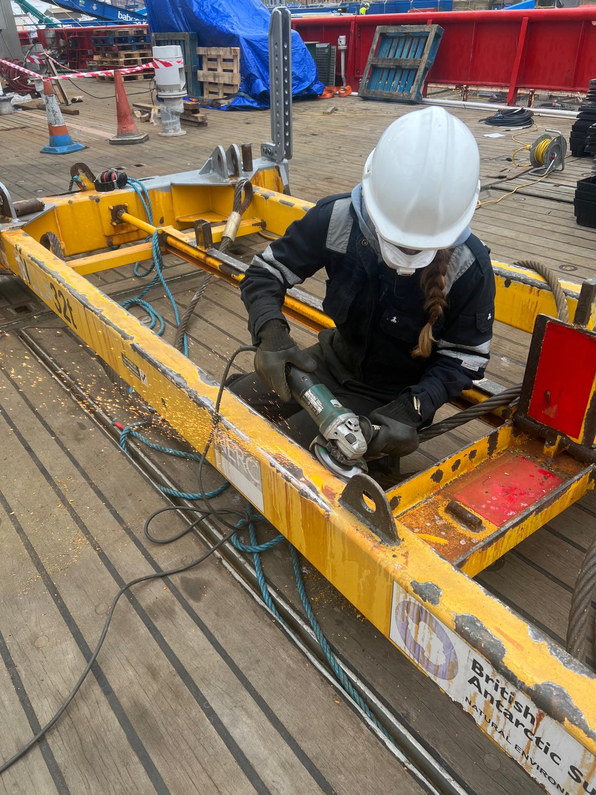 A woman in a hard hat